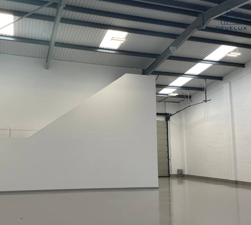 Warehouse interior refurbishment with freshly finished walls and floor