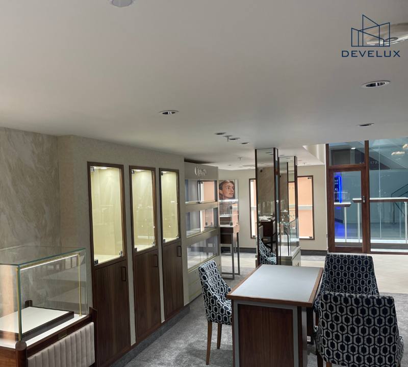 Luxury jewellery showroom with display cabinets and decorative finishes