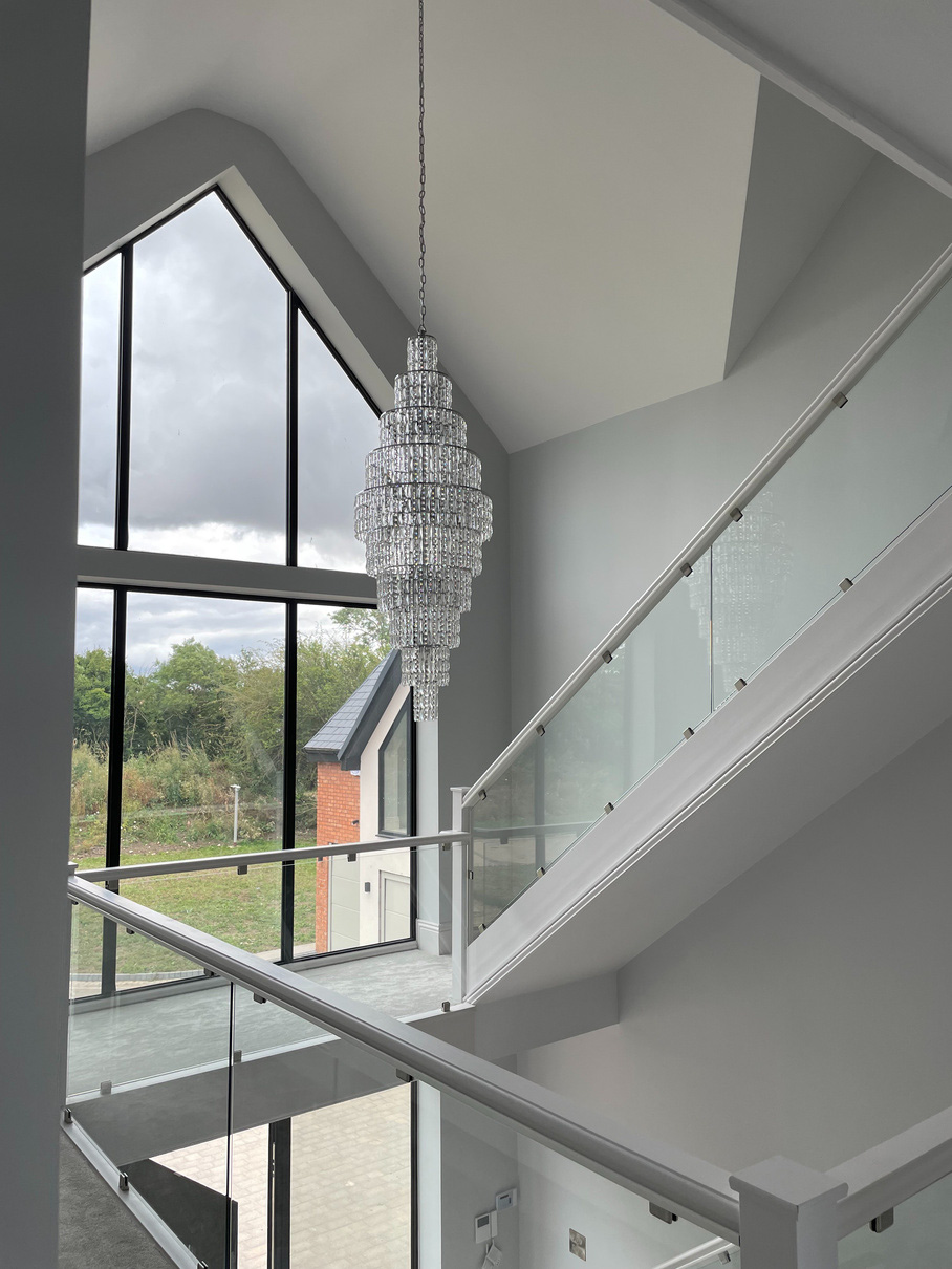 Chandelier hanging in a newly refurbished house